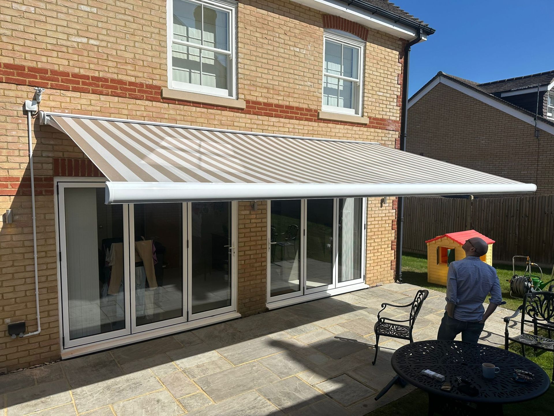 Aura Plus extended above bi-fold doors, Surrey