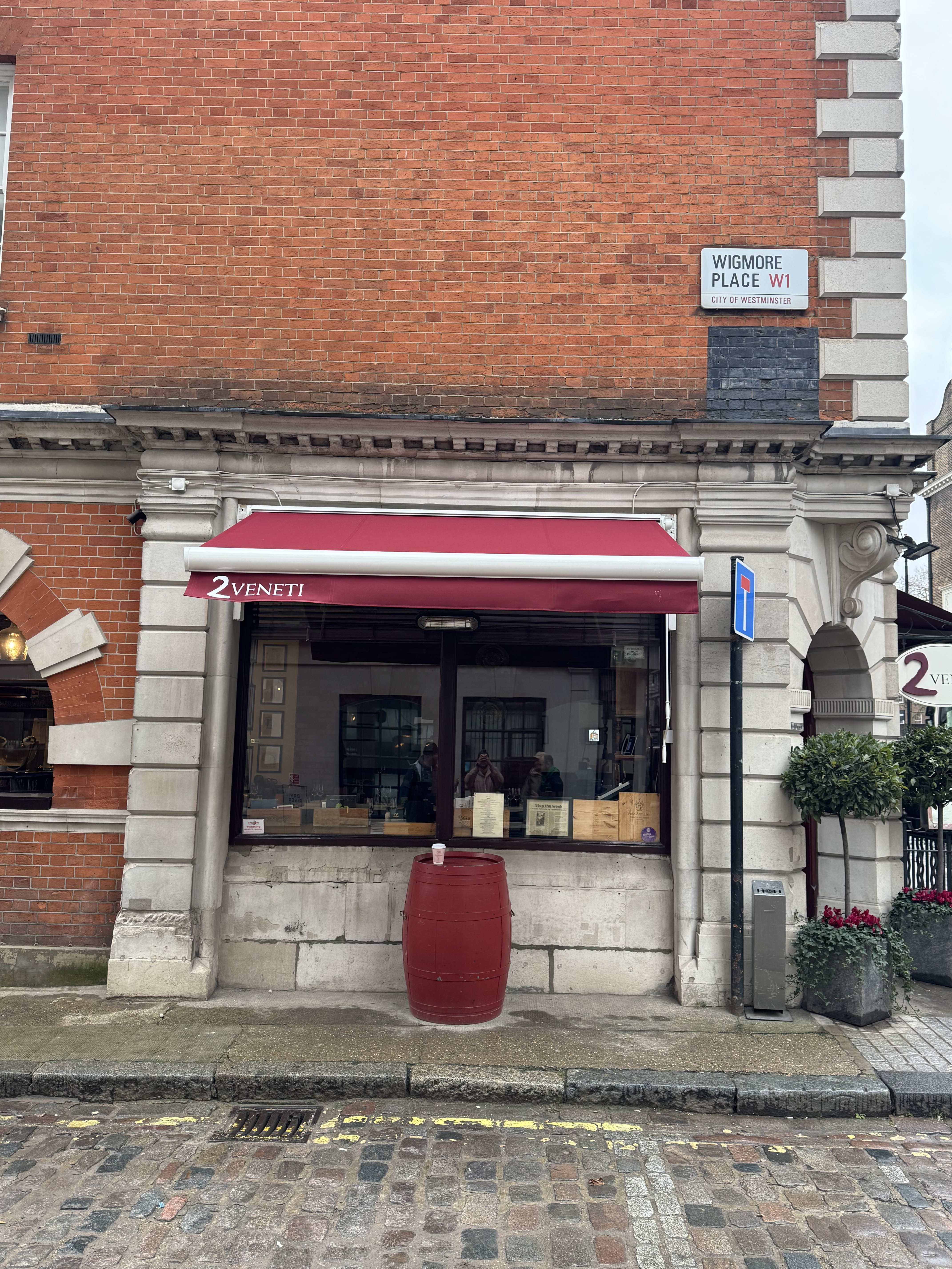 Burgundy Aura Plus awning fitted above 2 Veneti frontage on Wigmore Place, London